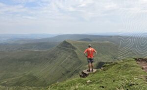 leadership development programmes UK - leader looking out over the mountains in the Brecon Beacons